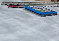 Roof restoration around skylight - primer coat